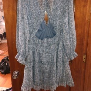 Blue cheetah print dress with an open back.